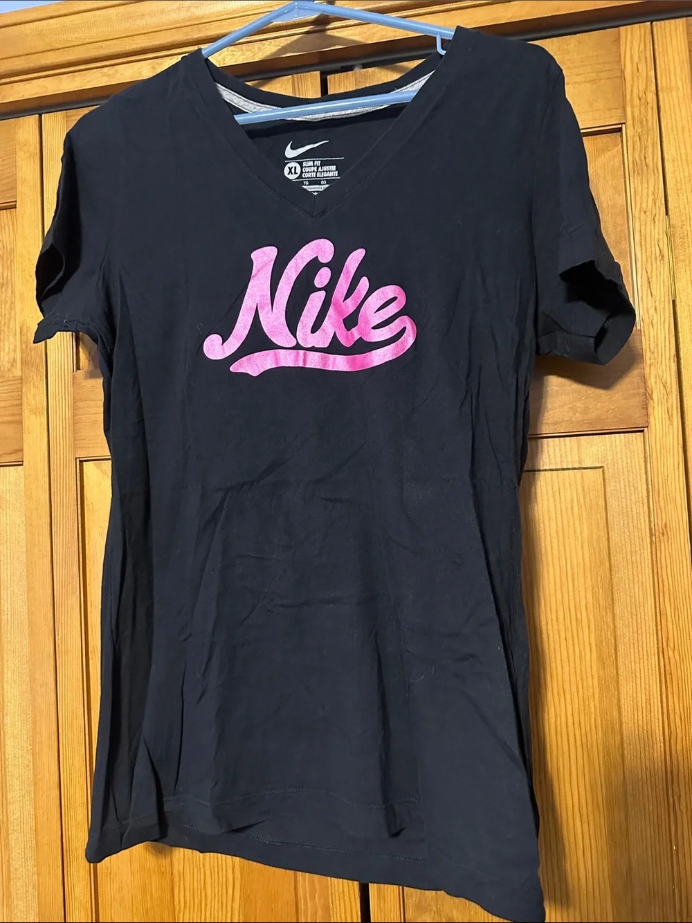 Nike Women’s Black V-Neck Tee with Pink Script Logo